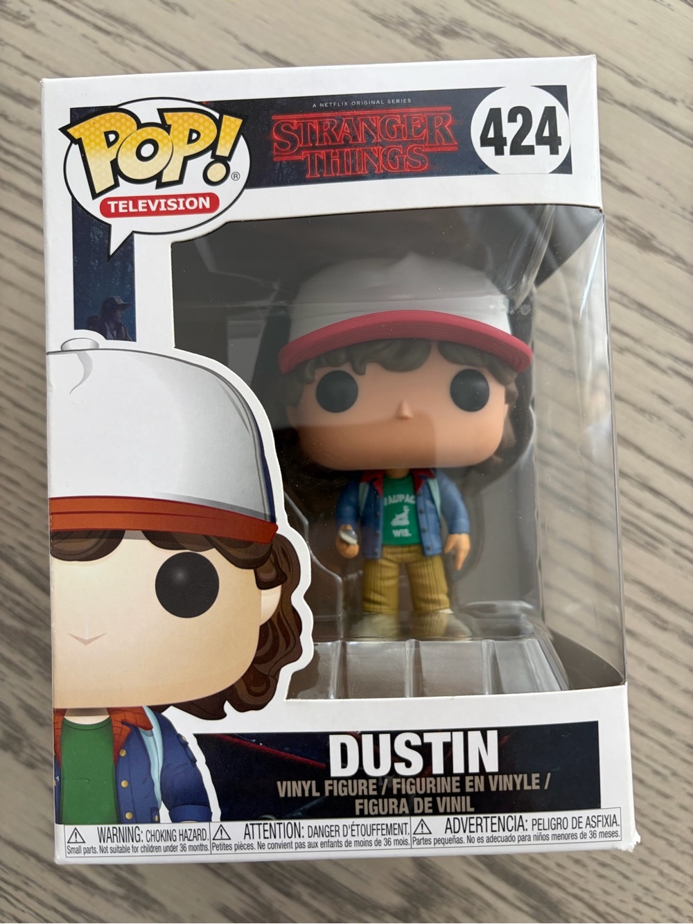 Funko Dustin Collectible with White and Red Cap, Blue Jacket